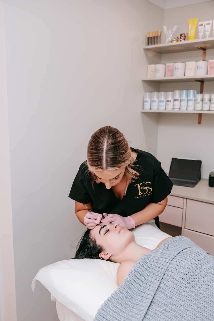 Brow tint service in progress by TGS Beauty therapist at Hammond Park clinic