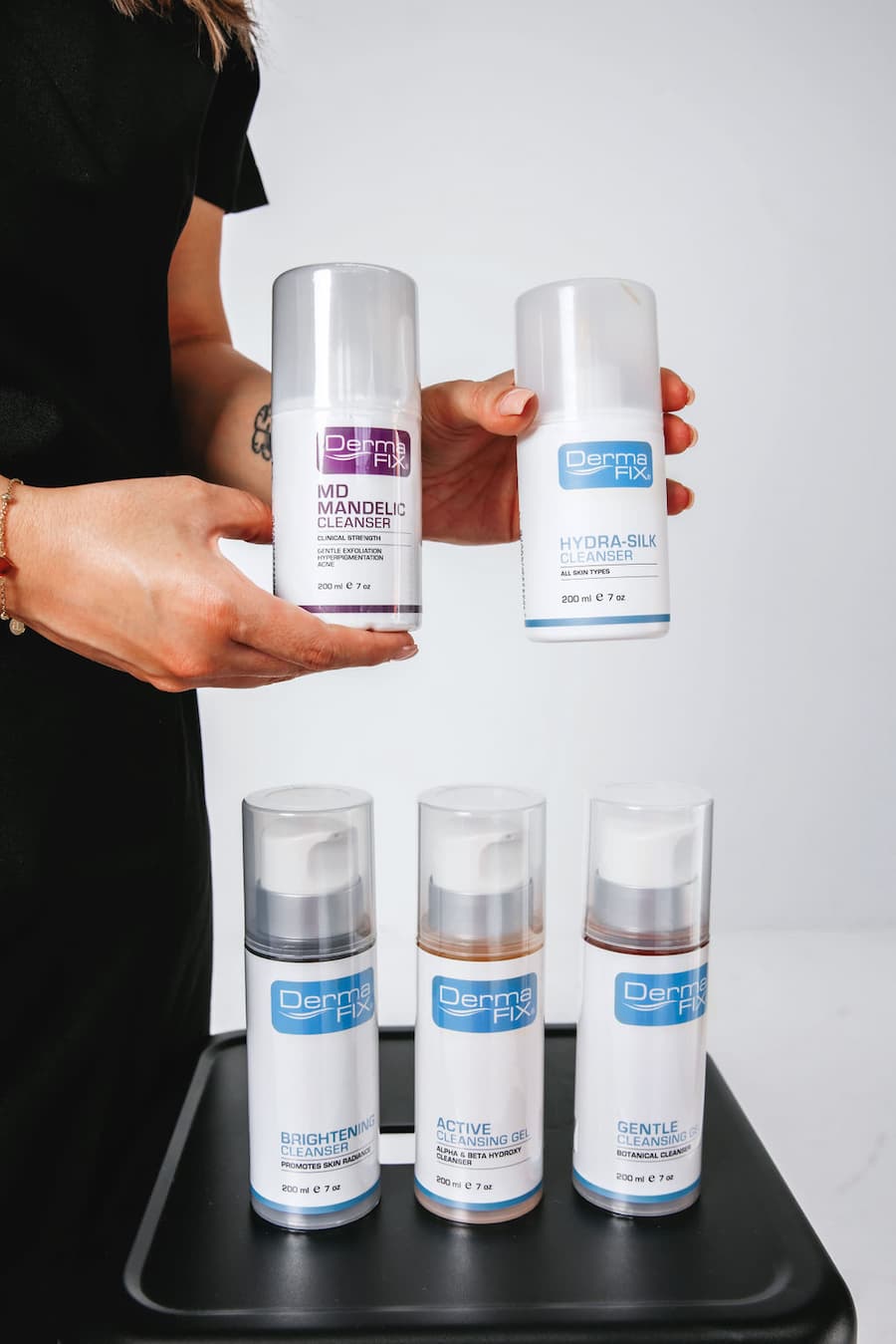 Selection of DermaFix cleansers held and displayed at TGS Beauty & Skin Perth