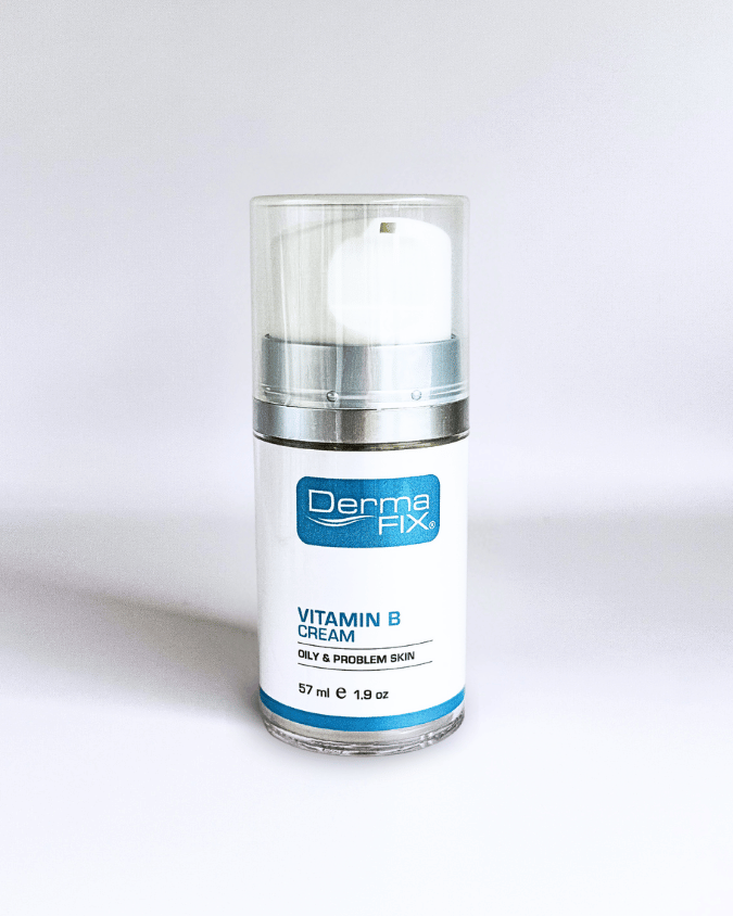 Front view of DermaFix Vitamin B Cream moisturiser in a clear pump bottle.
