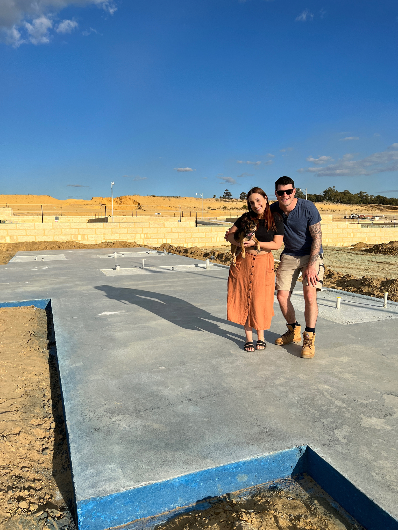 Jess and Andrew with their dog on new salon foundation in Hammond Park, owners of TGS Beauty & Skin