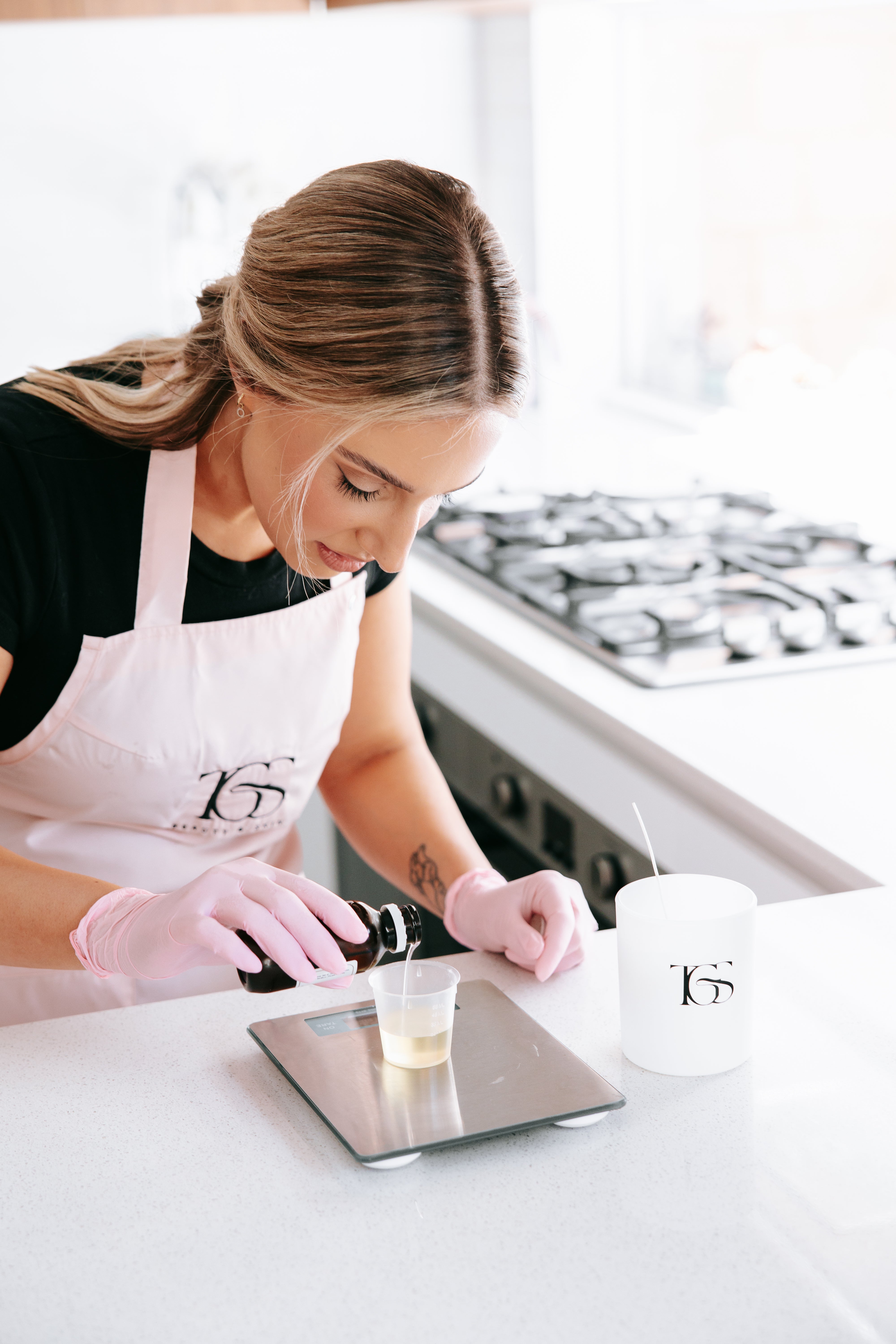 Load video: Jessica Dash hand-pouring luxury soy candles in small batches at TGS Beauty & Skin, showcasing the careful craftsmanship and attention to detail behind each handmade candle.