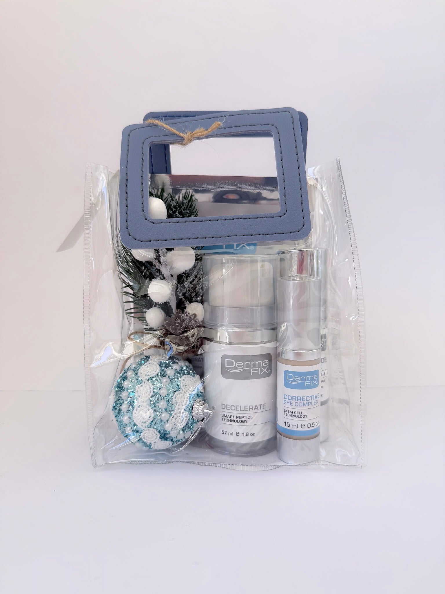 Packaged skincare products with decorative elements on a white background