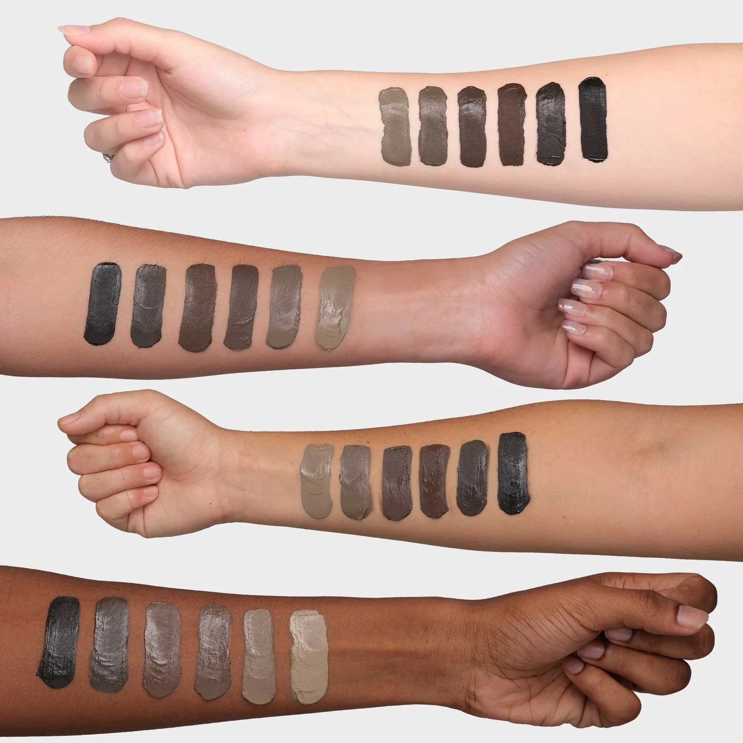 Brow Code Creamades Brow Pomade swatches displayed on different skin tones, showcasing six versatile shades from Ash to Granite for all brow colours.